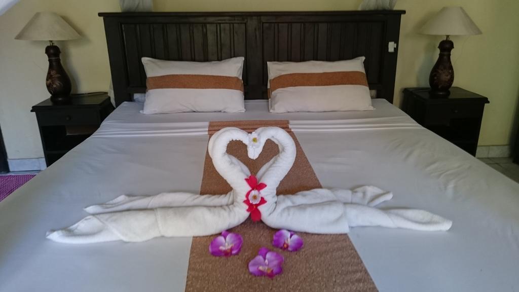 Barracuda Beach Hostel Amed Esterno foto