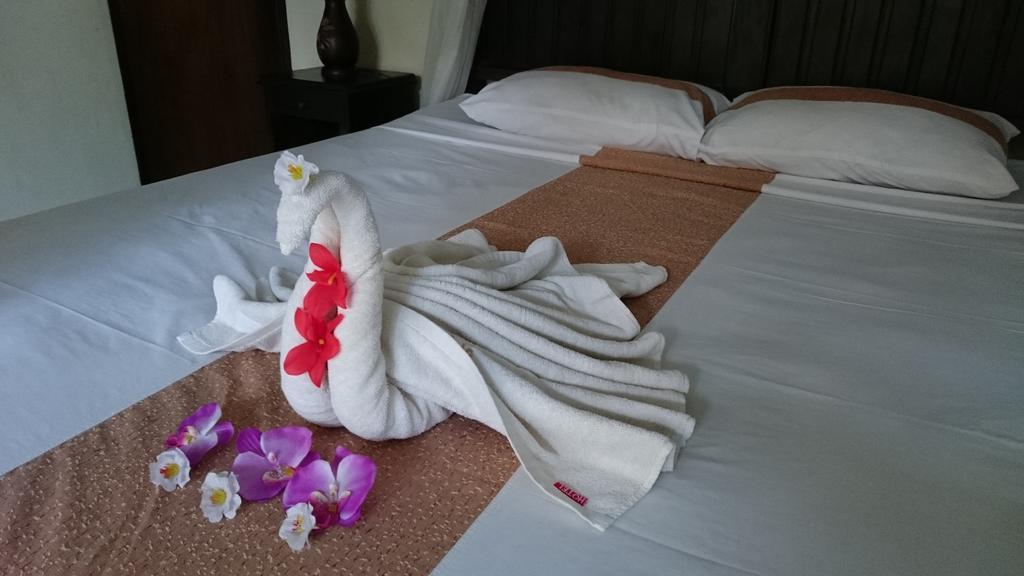 Barracuda Beach Hostel Amed Esterno foto