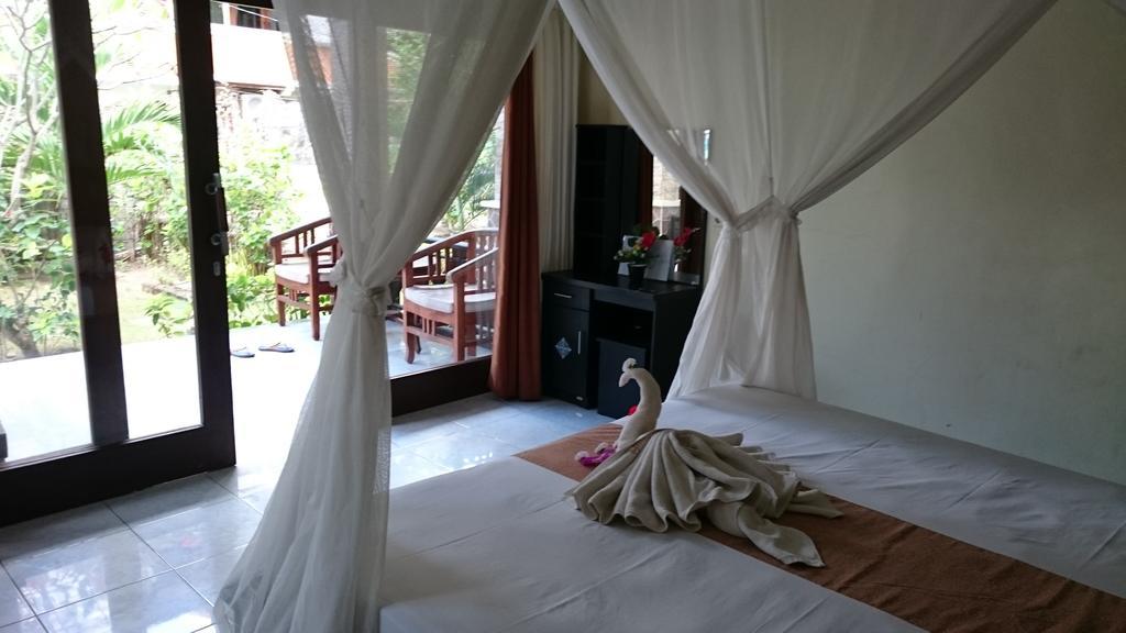 Barracuda Beach Hostel Amed Esterno foto